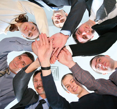 image of a group of people working together during a team building exercise